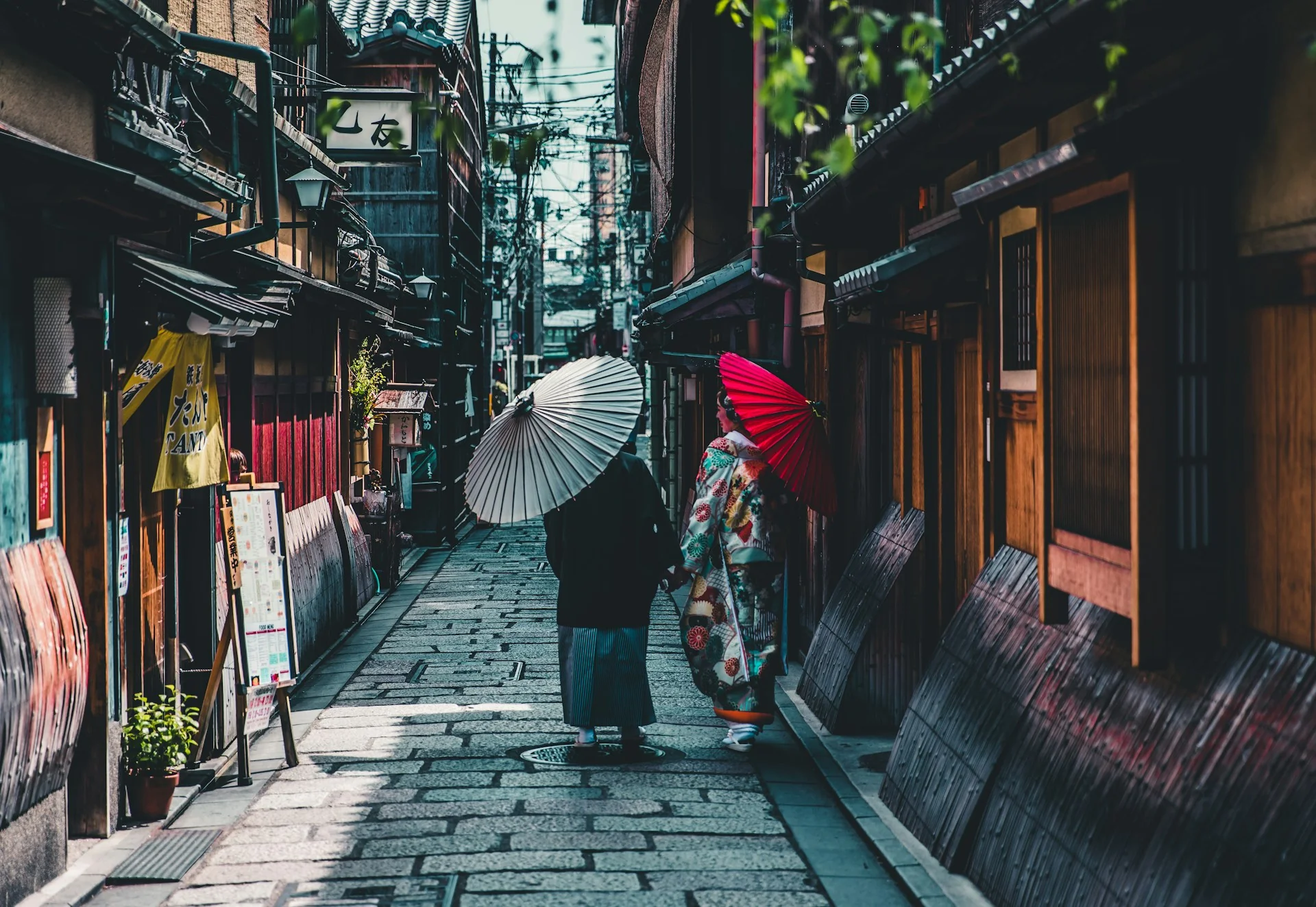 Traditional Japanese street scene with parasols